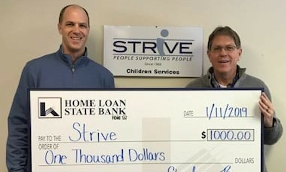 STRiVE received a check from our community partners Home Loan State Bank.